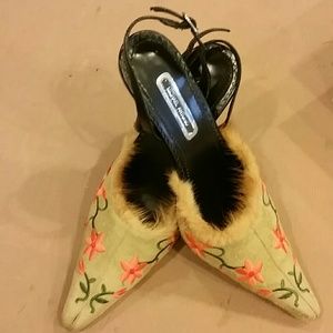 Embroidered slingback pump.